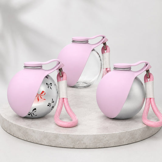 Blossom Travel Bottle in clear, bow print, and silver